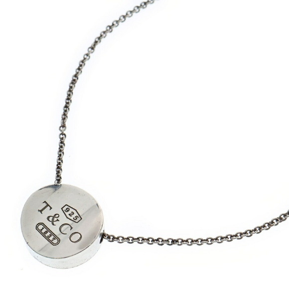 Tiffany Handbags - TIFFANY Co Concave Circle Necklace Silver Pendant